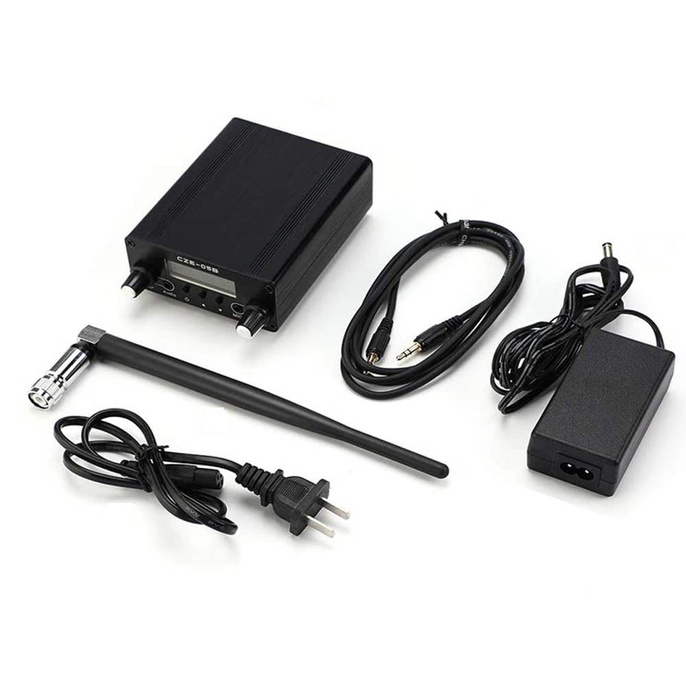 Package of FM transmitter for drive-in audio with antenna, audio cable and power supply
