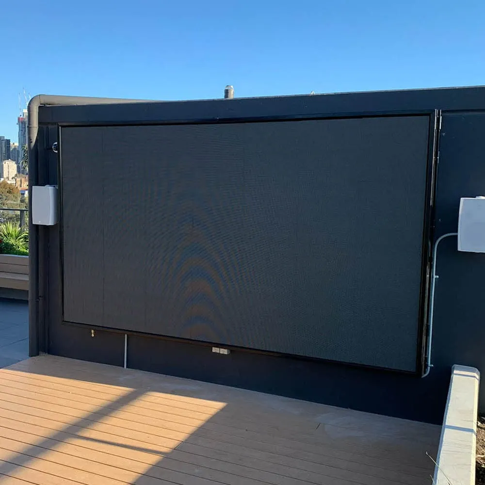 A 3m-wide outdoor cinema-grade LED screen on an engineered frame at dusk