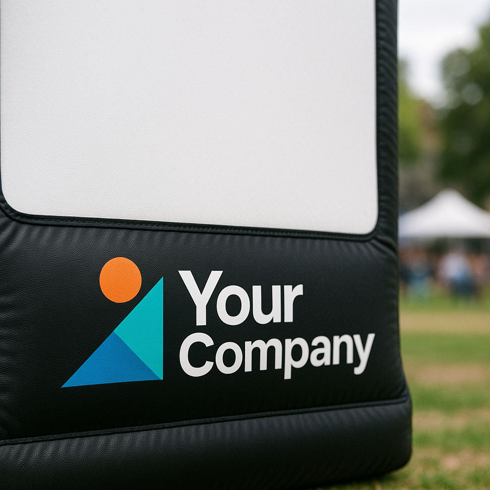 Inflatable projection screen with 'Your Company' logo in an outdoor setting